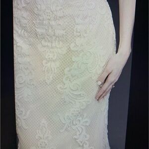 Wedding dress only wore during ceremony. Size 8 ivory.